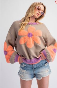 Introducing our Daisy Pattern Knitted Sweater PulloverTop. This stylish top features a unique daisy pattern detail on the sleeves and front, giving it a fresh and feminine look. With long sleeves, a rounded neckline, and a relaxed fit, it is both comfortable and stylish. Made from a soft blend of acrylic, nylon, and polyester, it is sure to keep you warm and cozy all day long. Perfect for any occasion. Trendy Spring Crew Neck Sweater, Trendy Crew Neck Sweater For Spring, Retro Textured Knit Spring Tops, Spring Soft Knit Crew Neck Sweater, Cute Crew Neck Sweater For Spring, Retro Textured Knit Sweater For Spring, Cozy Crew Neck Sweater For Spring, Retro Textured Knit Spring Sweater, Trendy Floral Print Crew Neck Sweater