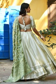 Off white blouse featuring gota detailing on the sleeves with tassel tie-up plunge back. Paired with a kalidar lehenga and a green floral pattern dupatta. - Aza Fashions Elegant Festive Sets With Back Tassel Tie-up, Elegant Saree Set With Tassels, Fitted Wedding Sets With Tassels, Wedding Sets With Tassels And Fitted Design, Off White Blouse, Green Floral Pattern, White Blouse, Set For Women, Aza Fashion