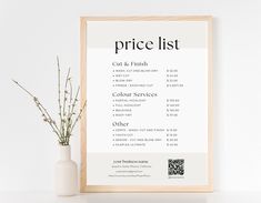 a price list is displayed next to a vase with flowers