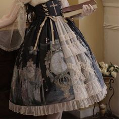 Get a spectacular look thanks to this Steampunk skirt, made with the greatest care. This stunning Steampunk skirt in a lolita style is made for women who pay attention to details. Its print depicts old clocks in a very fairy atmosphere. The skirt is high-waisted and gives a cinching effect. It is possible to adjust it thanks to the ribbons laced in the back. The dress is embellished with a beautiful tulle to provide volume and even more detail. The model in the pictures wears a crinoline underne Steampunk Skirt, Old Clocks, Steampunk Fashion, Lolita Fashion, Pay Attention, Sewing Projects, Victorian Dress, The Dress, Cotton Blend