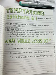 an open notebook with writing on it and some markers next to it that says,'what would jesus do? '