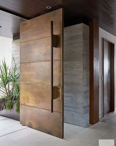 two pictures of the inside and outside of a house with wood paneling on the walls