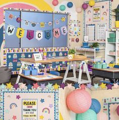 a classroom filled with lots of desks and decorations