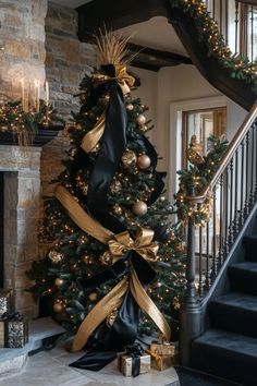 Grand Christmas tree and fireplace adorned with black gold and silver christmas decor Gold And Silver Christmas Decor, Black And Gold Christmas Tree, Gold Christmas Tree Decor, Silver Christmas Decor, Gold And Silver Christmas