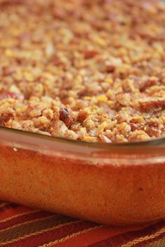 a casserole dish filled with food sitting on a table