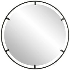 a round mirror with black lines around it