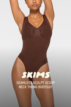 This scoop neck sculpting thong bodysuit enhances your natural shape while defining and smoothing your waist, core, tummy, and back. Features thick non-adjustable straps, center front and side stitching to define and support your bust, and a cotton gusset with snap closure. Fits true to size. | SKIMS Scoop Neck Thong Bodysuit | Deep Neutral | 2XS | Seamless Sculpt Shapewear Bodysuit With Seamless Construction, Sculpting Full Coverage Bodysuit With Seamless Construction, Sculpting Full-coverage Seamless Bodysuit, Backless Sculpting Seamless Bodysuit, Sculpting Seamless Backless Bodysuit, Solid Sculpting Shapewear With Seamless Construction, Stretch Seamless Push-up Bodysuit, Fitted Seamless T-back Bodysuit, Fitted T-back Seamless Bodysuit