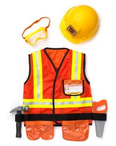 an orange safety vest, hard hat and glasses are laid out on a white surface