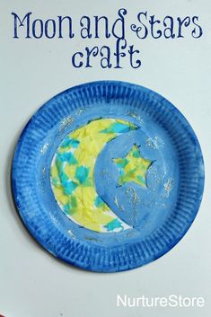 a paper plate with the moon and stars craft on it