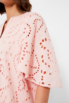 The Pink Salt Eyelet Finley Top is effortlessly chic and a style staple. Updated in a refreshing eyelet fabric, this blouse has a flattering silhouette, oversized flutter sleeves, and a V-neckline. Pair with gold accessories for everything from work to brunch for an effortlessly elevated look. Notched V-neckline Oversized flutter sleeves Boxy fit Eyelet fabric Material: 100% Cotton Care: Hand wash cold, hang to dry Relaxed Fit Eyelet Blouse For Summer, Summer Eyelet Blouse With Relaxed Fit, Chic Butterfly Sleeve Blouse For Spring, Chic Spring Blouse With Butterfly Sleeves, Spring Eyelet Blouse With Relaxed Fit, Spring Chic Blouse With Butterfly Sleeves, Feminine Spring Blouse With Butterfly Sleeves, Spring Casual Blouse With Cutwork Hem, Spring Daywear Blouse With Ruffle Sleeves