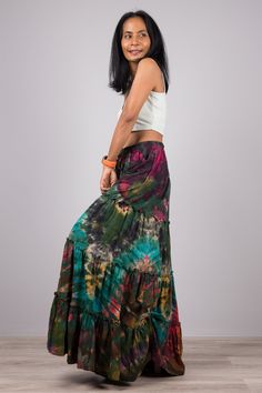 "Tie Dye Skirt, Festival Skirt, Hand Dyed Maxi Skirt , Hippie Skirt, lounge wear skirt, tiered skirt PRODUCT SIZE : One Size Fits Most * Waist : up to 40\" * Hips : up to 44\" * Length : 40\" MATERIAL * Cotton Tie Dye (T-shirt like) NOTE : * Model chest : 32\", waist : 24\" hips : 35\" * Combined Height is 5\"6 > I'm 5\"2 (158cm) and I'm wearing 4\" heels in the pictures PRODUCT CARE : * Wash separate in cold water. Lay flat to dry This skirt stands out from the crowd with its magnificent col Festival Skirt, Skirt Tiered, Hippie Skirt, Kaftan Top, Hippie Skirts, Festival Skirts, Loose Fitting Dresses, Maxi Skirts, Kaftan Dress