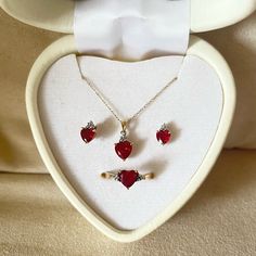 This Is A Heart-Shaped Jewelry Set. This Set Includes A Pair Of Beautiful Ruby Red Earrings, A Gorgeous Ruby Red Heart-Shaped Necklace On A Gold Chain And A 10k Gold Ring Topped With A Heart-Shaped Ruby With Diamonds. Red Heart Cut Jewelry With Diamond Accents, Red Heart Cut Diamond Accented Jewelry, Red Heart Cut Diamond Accent Jewelry, 14k Gold Heart Cut Red Jewelry, Red 14k Gold Heart Cut Jewelry, Red Hallmarked Jewelry For Valentine's Day, Red Heart-shaped Hallmarked Jewelry, Dr Jewelry, Gold Jewelry Set