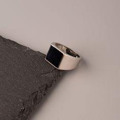 Square black enemal silver 925 ring. Minimalistic geometric style ring the perfect gift for him . An all day ring for men that want to be unique. - Material: Silver 925  - Plated: Platinum - Enemal: Black - Weight : 7.50 gr 0.26 oz  - Shape : Square We offer a lot of ring size options you can find at the photos the board with the numbers and you can see your ring size at your metric system you like. If you can't find your number we are here to answer all of your questions so do not hesitate to c Modern Black Open Signet Ring, Modern Silver Enamel Ring For Formal Occasions, Modernist Black Signet Ring With Polished Finish, Modern Black Enamel Ring Jewelry, Modern Black Enamel Ring, Black Minimalist Signet Ring With Polished Finish, Minimalist Black Signet Ring With Polished Finish, Black Minimalist Signet Ring For Everyday, Modern Black Enamel Open Ring Jewelry