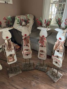 four metal reindeer decorations on display in a living room