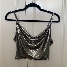 Adorable Never Worn Shiny Silver Slouchy Crop! Chic Fitted Silver Tank Top, Glamorous Silver Tank Top For Night Out, Silver Crop Top For Night Out In Spring, Metallic Shine Tops For Night Out, Fitted Silver Shine Tops, Fitted Silver Tops With Shine, Fitted Silver Shiny Tops, Silver Shimmer Tops For Night Out, Glamorous Metallic Silver Tops For Night Out