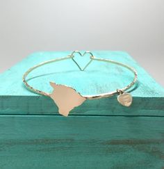 Hawaii Bracelet, Heart in The Big Island of Hawaii 14K gf Bangle Bracelet with Heart Clasp by Sparro Gold Heart Charm Bangle Bracelet, Gold Heart-shaped Bangle, Gold Bangle With Heart Charm, Adjustable Gold Open Heart Jewelry, Adjustable Open Heart Gold Jewelry, Gold Heart Shaped Bangle For Anniversary, Gold Heart-shaped Bangle For Anniversary, Gold Heart-shaped Anniversary Bangle, Gold Heart Bracelet Nickel Free