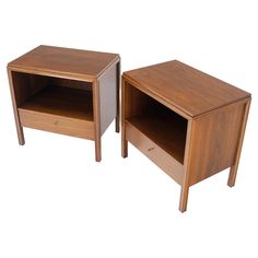 two wooden end tables with one open and the other closed on both sides, sitting side by side