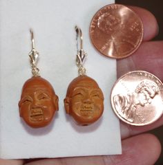 Absolutely spectacular antique arhat Buddha carved from olive pit prayer beads Measuring approximately 19 inches in length, the circumference around Each individually carved Buddha is differently carved with very intricate face A fabulous find from an estate sale in St. Louis, MO These prayer beads are a very unique and rare find I made these earrings from matched Buddha faces with 14k lever backs Unique, high polish, beautiful You will love weraing them. Antique Brown Carved Jewelry, Traditional Brown Carved Jewelry, Brown Carved Spiritual Jewelry, Spiritual Brown Carved Jewelry, Coral Roses, Buddha Face, How Lucky Am I, Coral Ring, Leverback Earrings