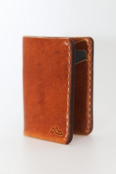 Minimalist Horween Wallet - L'Atelier Global Bifold Card Holder With Card Slots, Everyday Bifold Card Holder With Id Window, Handmade Bifold Card Holder, Bifold Card Holder With Slots For Everyday Use, Bifold Card Holder With Interior Slots, Laramie Wyoming, Horween Leather, Leather Company, Bifold Wallet