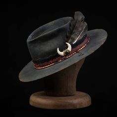 The Bandit Drifter is a 100% Wool Felt, Western high quality hat. Thick and durable and made to last a lifetime.Distressed fabric band with multiple layers of leather cord. The inside has a comfortable leather sweatband with a satin liner.Handmade, one of a kind from GrimHat.The size of the hatis based on the circumference of the head.In order to determine the proper hat size, you must measure your head.Use the table below to determine your hat size based on your measurements.Worldwide Shipping Adjustable Rustic Fedora, Rustic Adjustable Fedora, Adjustable Rustic Fedora Hat, Rustic Adjustable Hats For Fall, Rustic Adjustable Brimmed Top Hat, Rustic Adjustable Felt Hat With Short Brim, Vintage Fedora For Outdoor Fall Events, Vintage Flat Brim Fedora For Outdoor, Rustic Adjustable Brown Top Hat