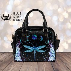 "► ABOUT THIS PURSE Colors: black, turquoise, teal blue, green Gorgeous watercolor flowers with dragonfly and moon phases. Black background. Black purse. Makes a great gift for yourself or anyone you cherish. Show your magical side with this awesome custom purse. Express international shipping (cost of up to $25) is included in the price. The design is printed on both sides. The sides, bottom, handle and trim are black. * Manufactured with premium water-resistant PU vegan leather. * Features com Blue Satchel Bags, Turquoise Top Handle Shoulder Bag For Travel, Blue Satchel Shoulder Bag As Gift, Blue Shoulder Bag Satchel For Gift, Blue Handheld Satchel As A Gift, Handheld Blue Satchel As Gift, Blue Crossbody Bag As Gift, Blue Shoulder Bag As A Gift, Blue Handheld Satchel As Gift