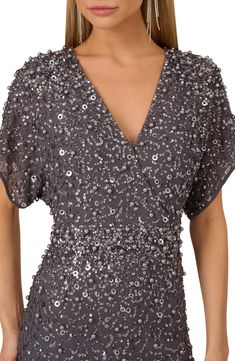 Glimmering embellishment details bring party-ready energy to this dolman-sleeve cocktail dress. 36" length Back zip closure Surplice V-neck Short sleeves Lined, except sleeves 50% viscose, 35% nylon, 15% metallic fibers Spot clean Imported Embellishment Details, Adrianna Papell, Nordstrom Dresses, Dolman Sleeve, Cocktail Dress, Short Sleeves, Nordstrom, Energy, V Neck