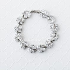 Set in rose gold or rhodium silver plate, this beautiful CZ bracelet is created with round, marquise or pear cut stones. It is 7 inches long and .5 inches wide Formal Bracelets, Jewellery Traditional, Cheap Silver Rings, Rose Gold Plate, Simple Silver Jewelry, Vintage Inspired Earrings, Wedding Bracelets, Bracelet Set Silver, Cz Bracelet