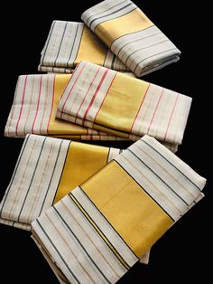 Kerala traditional Vishu collection  tissue Set Mundu , 2.8 meters length single set. The both pieces are with gold border and beautiful stripes.  We have 3 colors options. please select options while placing the order   1. Black -  black and gold stripes  all over the set mundu and beautiful Gold kasavu border  2.Bottle green- green and gold stripes  all over the set mundu and beautiful Gold kasavu border  3.Red- black and stripes  all over the set mundu and beautiful Gold kasavu border Traditional White Sets With Printed Border, Traditional Gold Dupatta With Printed Border, Gold Saree With Printed Border, Gold Traditional Wear With Border For Puja, Traditional Gold Wear With Printed Border, Gold Traditional Wear With Printed Border, Gold Saree Set For Ceremonial Occasions, Gold Traditional Wear With Printed Border For Diwali, Festive Gold Handloom Sets