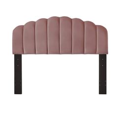 an upholstered headboard with black legs and pink velvet fabric, on a white background