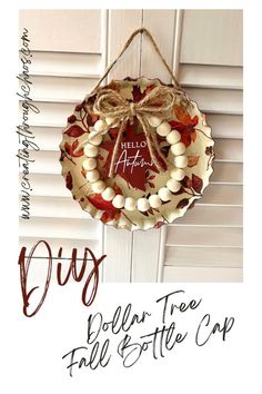 a wreath hanging from the side of a door with words above it that read, diy dollar tree fall & site cup