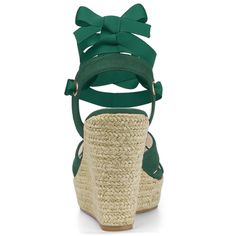 The classic espadrille design makes you a trendsetter in the crowd and makes you more comfortable no matter how long you walk. The lace-up bandage makes you the slimmest and hottest one in the crowd! Layers of beautiful espadrille jute wrap around the signature platform wedge of these eye-catching sandals in buttery soft faux suede. Easy to be paired with your favorite denim jeans, shorts, skirts, and your everyday casual wear! Casual Adjustable Lace-up Heels, Adjustable Lace-up Platform Wedge Sandals, Synthetic Lace-up Sandals With Cushioned Footbed, Casual Lace-up Wedge Sandals With Woven Sole, Adjustable Lace-up Wedge Heel Sandals For Vacation, Spring Green Sandals With Woven Sole, Trendy Adjustable Flat Heel Wedge Sandals, Platform Lace-up Sandals For Beach, Casual Synthetic Platform Lace-up Sandals