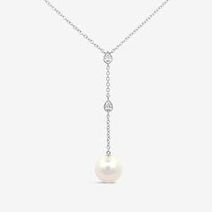 A statement piece for any stylish bride to be, this Pearl and Diamond Lariat Necklace is the perfect addition for your special day. The necklace features a two-inch gorgeous drop Pearl lariat adorned with two delicate bezel set pear shaped Diamonds. Wear with our matching earrings. White Fresh Water Pearl: 7 mm Natural Diamonds: 0.25ctw 14K White or Yellow Gold Drop: 2 Inches Length: 18 Inches Mavilo Exclusive Diamond Lariat Necklace, Stylish Bride, Pearl Lariat, Fresh Water Pearl, Earrings White, Pear Shaped Diamond, Pearl Diamond, Bride To Be, Lariat Necklace