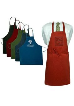 four aprons with different colors on them and one is red, green, blue