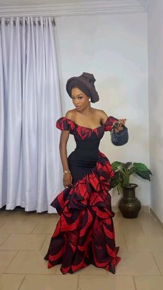 Ankara dress inspo red and black long Ankara African dress inspo owambe outfit inspo off shoulder train frills ruffles Ankara asoebi style Ankara Bridesmaid Dresses African Prints, Off The Shoulder African Dress, African Dress For Prom, Red African Dress Ankara Styles, Off Shoulder African Dress, Red Ruffle Dress Outfit, Ankara Owambe Gown Styles, Styles To Sew With Ankara, Ankara Asoebi Dress Styles