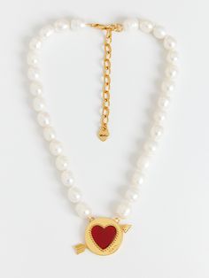 Editor's NotesThis charming viollina jewelry is ideal for adding a little luxury to add to any look.- Flat carnelian setting in heart shape- Cupid's arrow passing through coin pendant- Classic bold pearl setting chain- Daily point itemMeasurements(in.)- Length: 15.94 in. + 1.97 in.- Pearl: 0.39 in. * 0.43 in.Composition & Care- Freshwater Pearl, Carnelian, Brass, 22k Gold Plating- Avoid moisture and store in a zipper bagDesigner- by VIOLLINA Pearl Setting, Cupid Heart, Cupids Arrow, Gold Pearl Necklace, Accessories Jewelry Necklace, Coin Pendant, 22k Gold, Zipper Bags, Women Accessories Jewelry