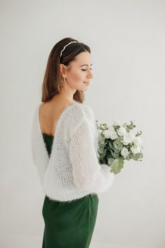 "Mohair sweater is a unique piece for a cold wedding day that will keep you warm and make your look magical. A completely weightless wedding sweater, wraps you in a warm cloud. This is the perfect solution for autumn and spring, will make your look feminine and light. The pattern is so interesting that you will not go unnoticed. A warm and soft bridal sweater is perfect for stylish minimalist dresses, as well as for fluffy lace dresses of different styles. The bottom hem of the sweater has a spe White Wool Sweater, Cold Wedding, Wedding Sweater, Bridal Sweater, Pull Mohair, Woolen Clothes, Long Tunic Dress, Wool Jackets Women, Bridal Shrug