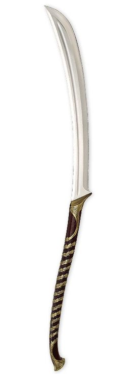 a knife that is sitting on top of a white surface with gold trimmings