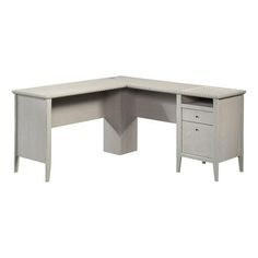 an l shaped desk with two drawers and a cabinet on the bottom half of it