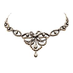 Edwardian Silver over Gold, Flexible Diamond Necklace in its original fitted box from A. Leroux, 1 Rue Dumes, Le Mans, with 11 European cut round diamonds prong set, H-I color, VS-SI clarity, weighing about 2.75 carats total, and 300 rose cut diamonds, prong and bezel set, H-I color, VS-SI clarity, weighing about 4.50 carats total. Edwardian Necklace, Bezel Set Necklace, Diamond Flower Pendant, Vintage Choker Necklace, Silver Diamond Necklace, Edwardian Jewelry, Round Necklace, Gold Diamond Necklace, Bezel Set Diamond