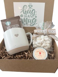 starbucks coffee mug and marshmallows in a gift box