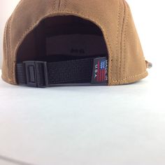 "Handmade cap with pencil holder✏️ ✎DETAILS: 5 panel cap is handmade from 12oz heavy duty caramel duck canvas ( made in USA). Sewn with golden heavy duty top stitch thread. Patch, brim and hardware made in the USA. The brim is not a bought plastic insert. Brims are handmade here in house, they are shorter and softer than typical hats. They are super comfortable yet still completely hand washable and incredible durable. Hand built by two human makers ( apes/April & bird/Rich) with love, care Vintage Adjustable Canvas Baseball Cap, Brown Canvas Baseball Cap, Adjustable Baseball Cap Made In Usa For Outdoor, Adjustable 5-panel Canvas Trucker Hat, Adjustable Canvas 5-panel Trucker Hat, Adjustable Canvas 5-panel Snapback Hat, Adjustable 5-panel Canvas Snapback Hat, Adjustable Brown Canvas Baseball Cap, Adjustable Outdoor Baseball Cap Made In Usa