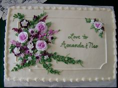 a cake decorated with flowers and the words one to annda tis on it