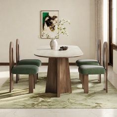 a dining room table with four chairs and a vase on the table in front of it