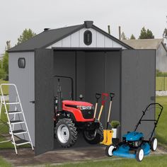 a tractor parked in front of a shed with tools on the ground next to it