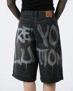 Revolution Spray Oversized Jorts Hip Hop Style Relaxed Fit Shorts, High Waist Cotton Hip Hop Bottoms, Grunge Cotton Bottoms With Letter Print, Trendy Baggy Shorts For Streetwear, Urban High Waist Cotton Bottoms, Oversized Grunge Bottoms For Summer, Edgy Cotton Bottoms For Fall, Baggy Cotton Bottoms For Streetwear, Urban High-waist Cotton Bottoms