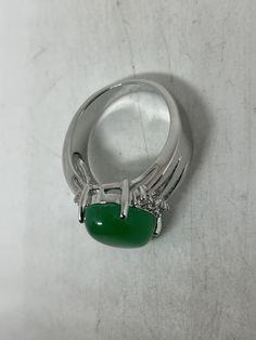 Vintage Lucky Green Nephrite Jade ring Fun jade is color enhanced Large green nephrite jade Ornate German Silver Vintage ring, does not tarnish, NOT sterling Size 5.5, 5.75, 6.25, 6.5 6.75, 7.75, and 9.25 All rings are shipped free in the US in a nice gift box. Check out our over a THOUSAND great reviews Engraving is $4 per letter and is not always perfect depending on the piece. It can take a few days if the jeweler is busy. This is payable to Paypal Judithsltd@gmail.com Green Cabochon Round Stone Rings, Green Emerald Cabochon Rings, Formal Green Turquoise Gemstone Ring, Green Jade Round Stone Jewelry, Polished Chrysoprase Ring Jewelry, Green Crystal Gemstone Ring, Green Jade Jewelry With Round Stone, Green Gemstone Crystal Ring, Green Rings With Polished Finish And Round Stone