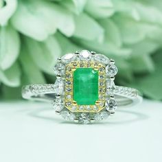 >>>>EMERALD RINGS BASIC INFORMATION <<<< Stone: Natural Emerald.Stone Size: 4*6 mm.Gemstone of Origin: Colombia.Side stones: Shining CZ diamond (cubic zirconia). Metal Materials: 925 Sterling Silver, 18K gold plated. >>>> CUSTOM METALS <<<< Emerald Ring Size: From US# 2 to US# 16Also can accept customized Solid Gold (18K White Gold/ Rose Gold/ Gold). >>>> SIMPLE DESIGN AND GOOD EMERALD <<<>>> GIFT PACKAGE <<<& Dazzling Emerald Ring With Halo Setting For Promise, Silver Emerald Ring With Halo Detail, Emerald Cut Halo Sterling Silver Jewelry, Emerald Cut Halo Jewelry In Sterling Silver, Green Sterling Silver Halo Ring, Sterling Silver Green Halo Ring, Anniversary White Gold Emerald Open Ring, Dazzling Green Halo Setting Rings, White Gold Rings With May Birthstone