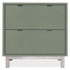 a green cabinet with two drawers on the bottom and one drawer open to reveal something