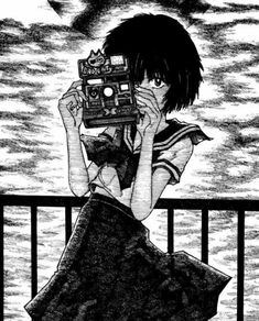 an anime character is holding up a camera