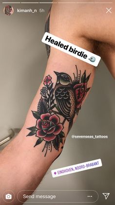 a person with a bird tattoo on their arm and the words healed birds above it